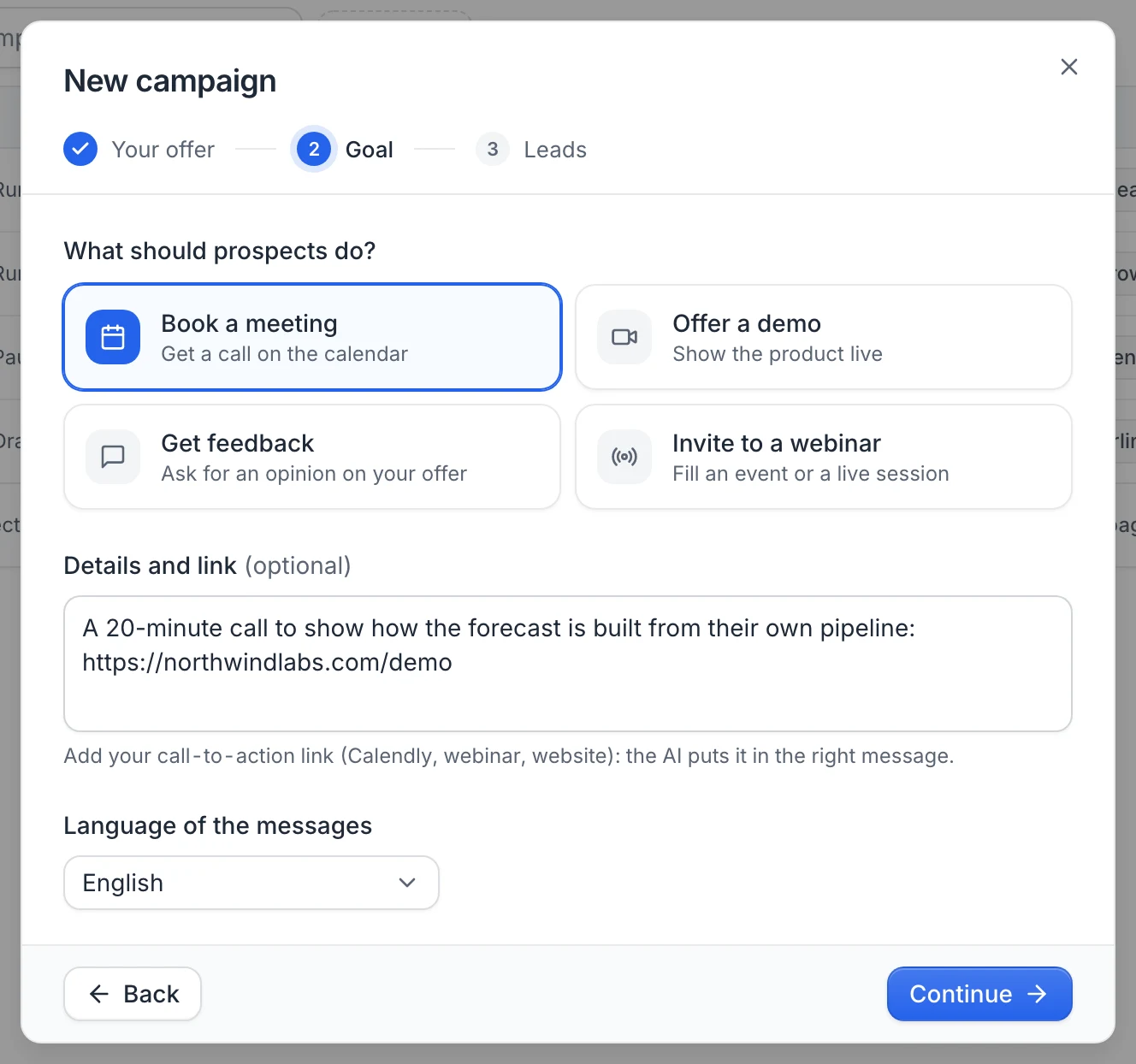 The Goal step of the wizard: Book a meeting selected among the four goals, the details with a demo link, and the language of the messages